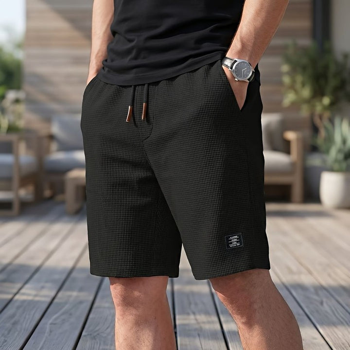 Herreshorts med elastisk talje og sidelommer