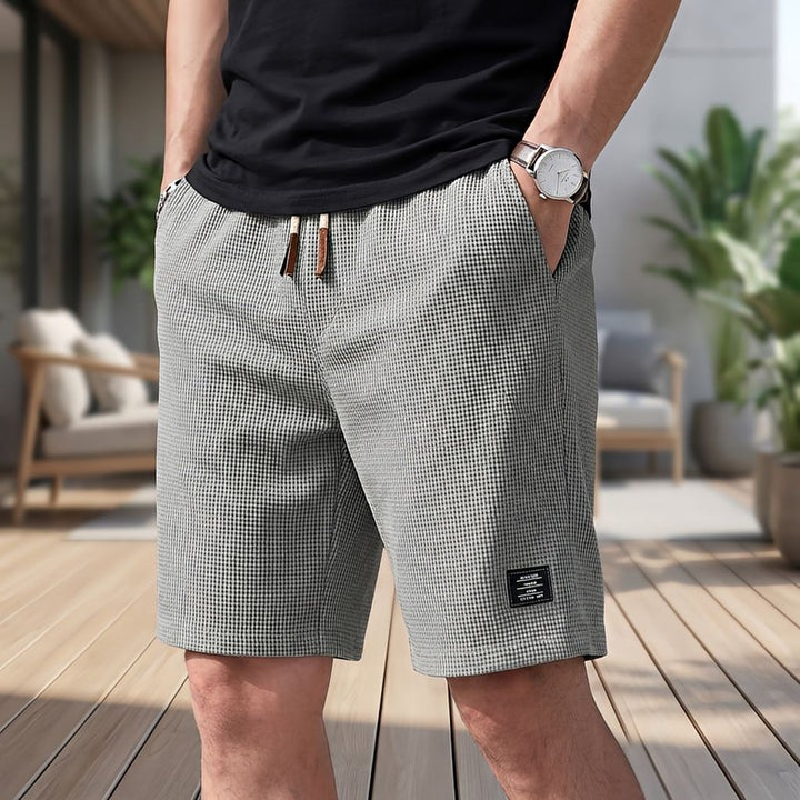 Herreshorts med elastisk talje og sidelommer
